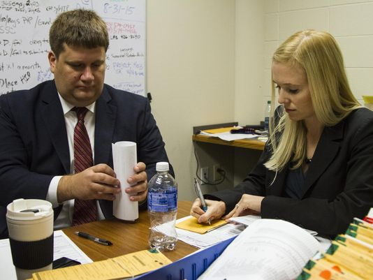 Assistant Commonwealth Attorneys John Balenovich and Diane Arnold review cases to see if they are eligible for the new rocket docket. (Photo: Matt Herp, Special to the C-J)
